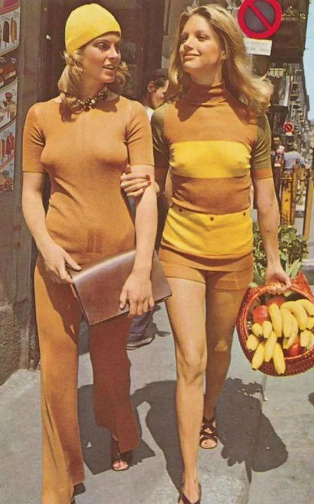 Two women walking braless